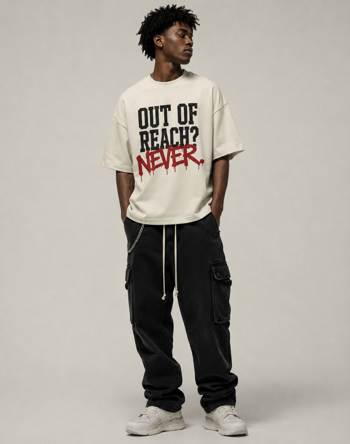 "Out of Reach? NEVER." Tee